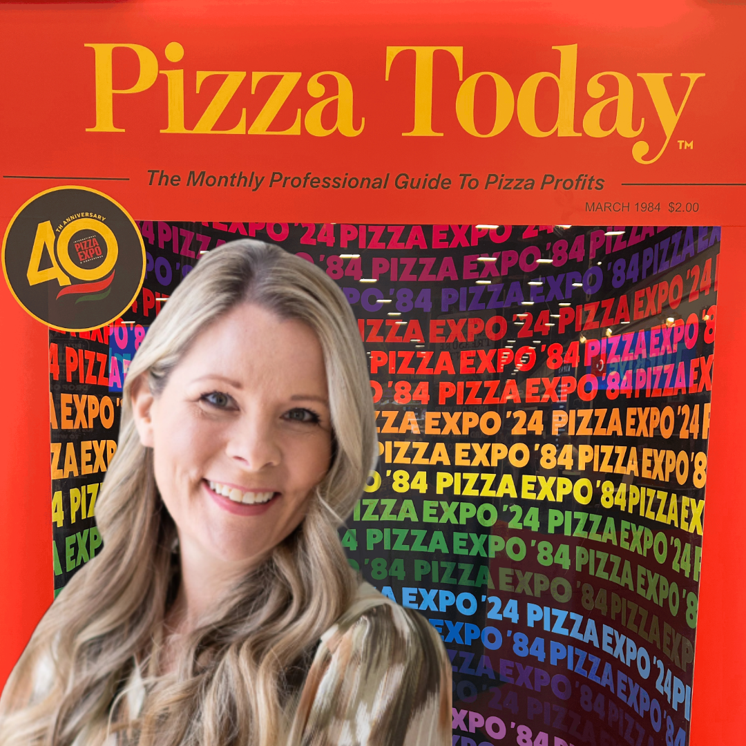 Image of Julie (Pizzajules) in front of the pizza expo 24 exhibit (40th year celebration).